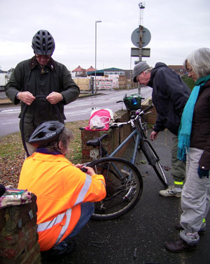 Mick's puncture outide 'Millionaires Row'