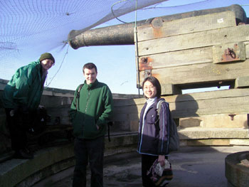 Joyce, Neil and Mei admire the big cannon 