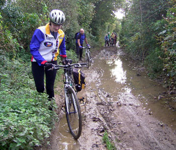 Jennifer and Mano avoid the mud 