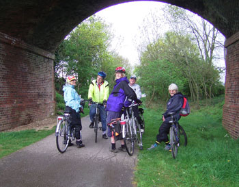 As the others shelter under a bridge