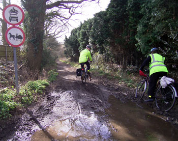 Mud - and a horse and wagon sign