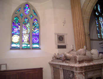 The John Piper window, representing the tree of life, plus Sir John Gage and his wife