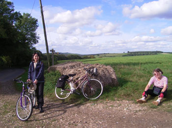 Mei and Joyce takes a breather at the top of a hill