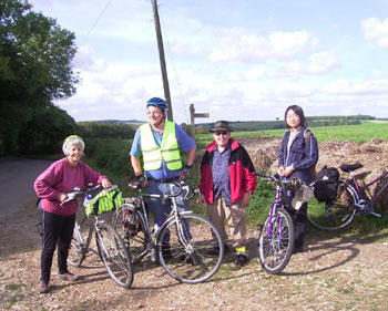 Sheila, Ian, Fred and Mei prepare for the descent