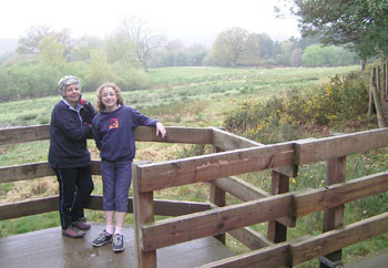 Sheila and Eliane on the deer viewing platform  (deer are dots in the distance, feeding time is not until 2pm!)